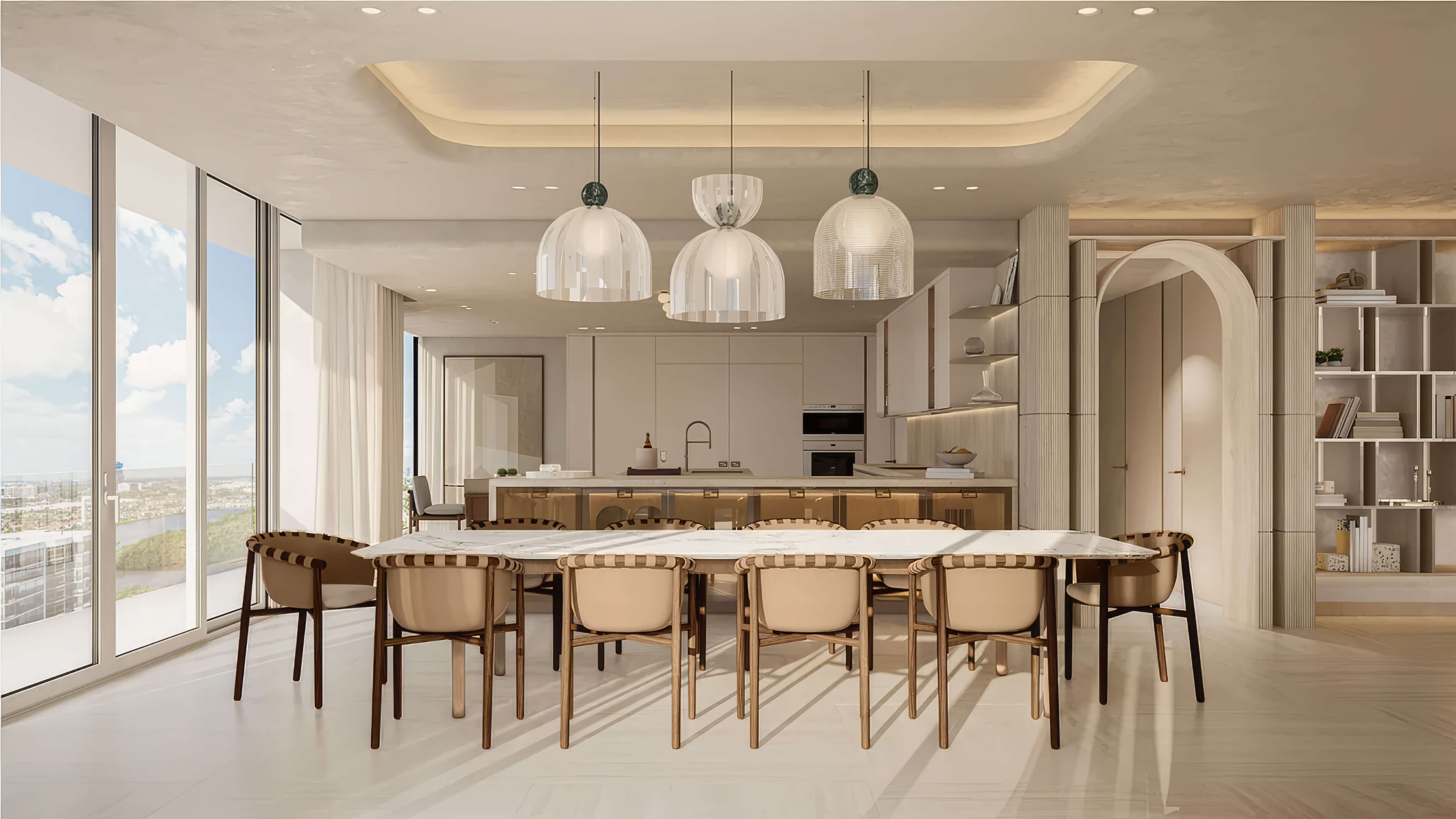 Open-concept kitchen and dining area in Aventura at Avenia by Fendi Casa with modern lighting and coastal views