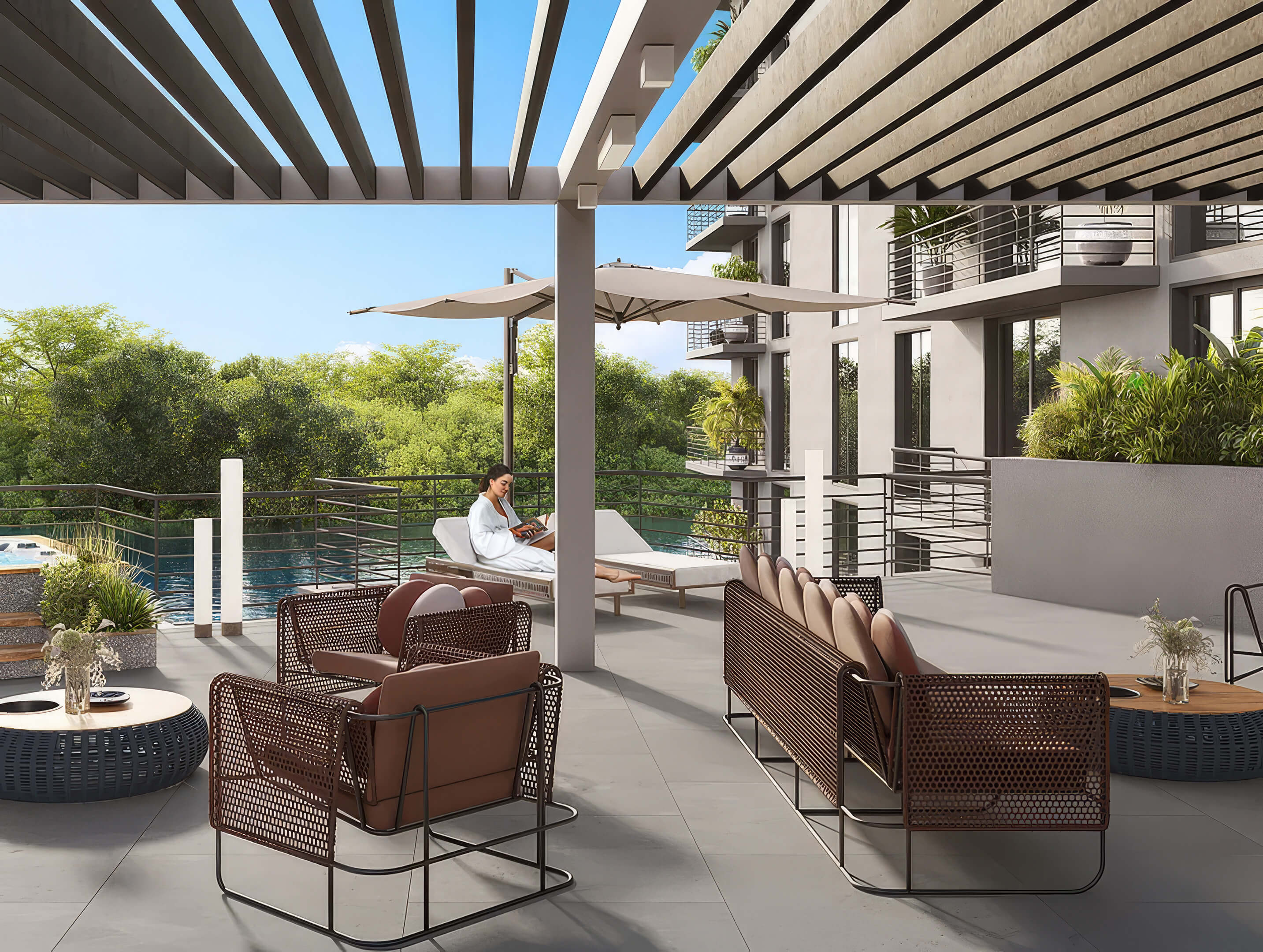 Covered terrace lounge at Canal by IQ with modern seating, shaded pergola and canal views