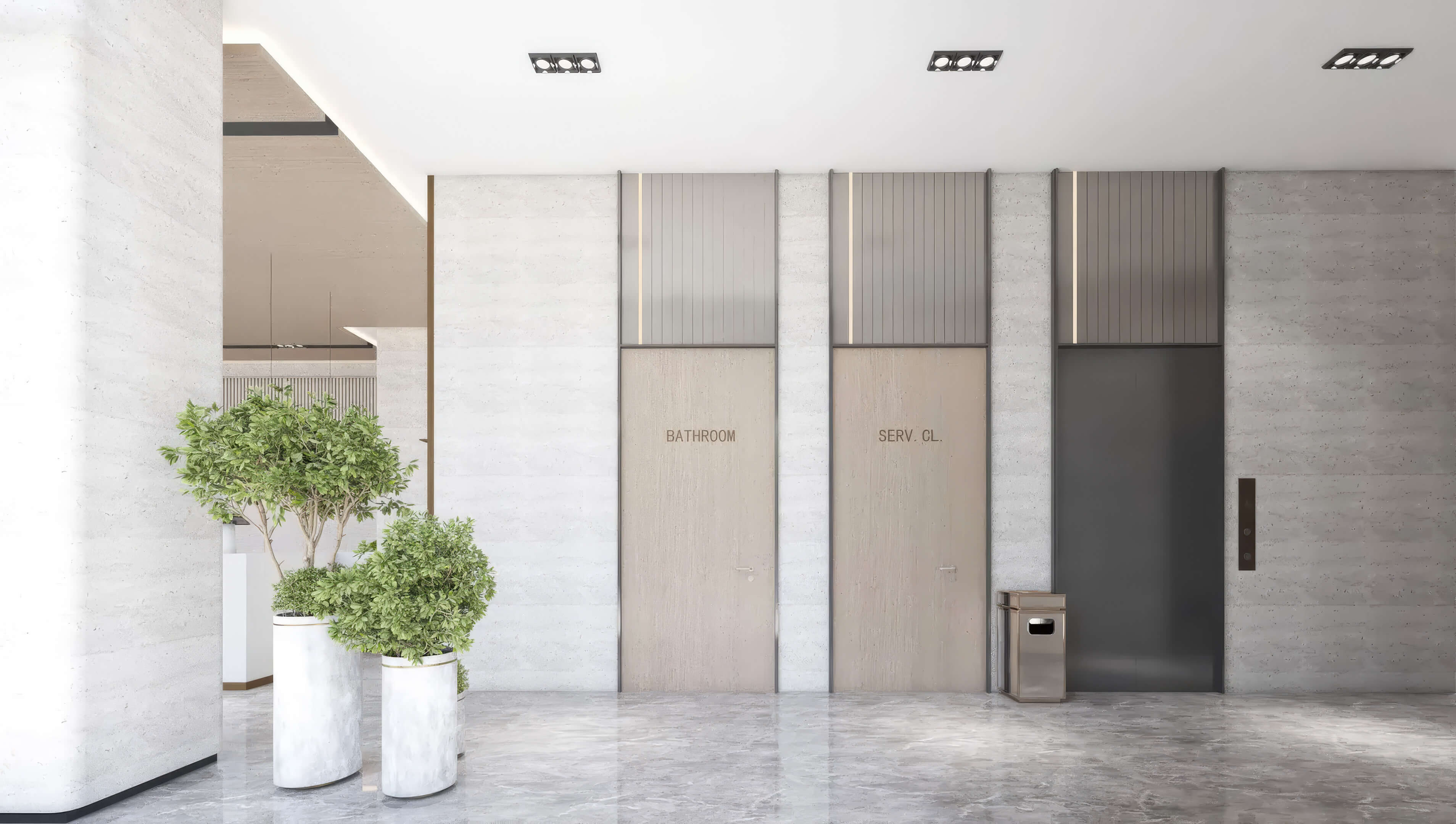 Elevator lobby interior at Canal by IQ with marble flooring, service doors and modern planters