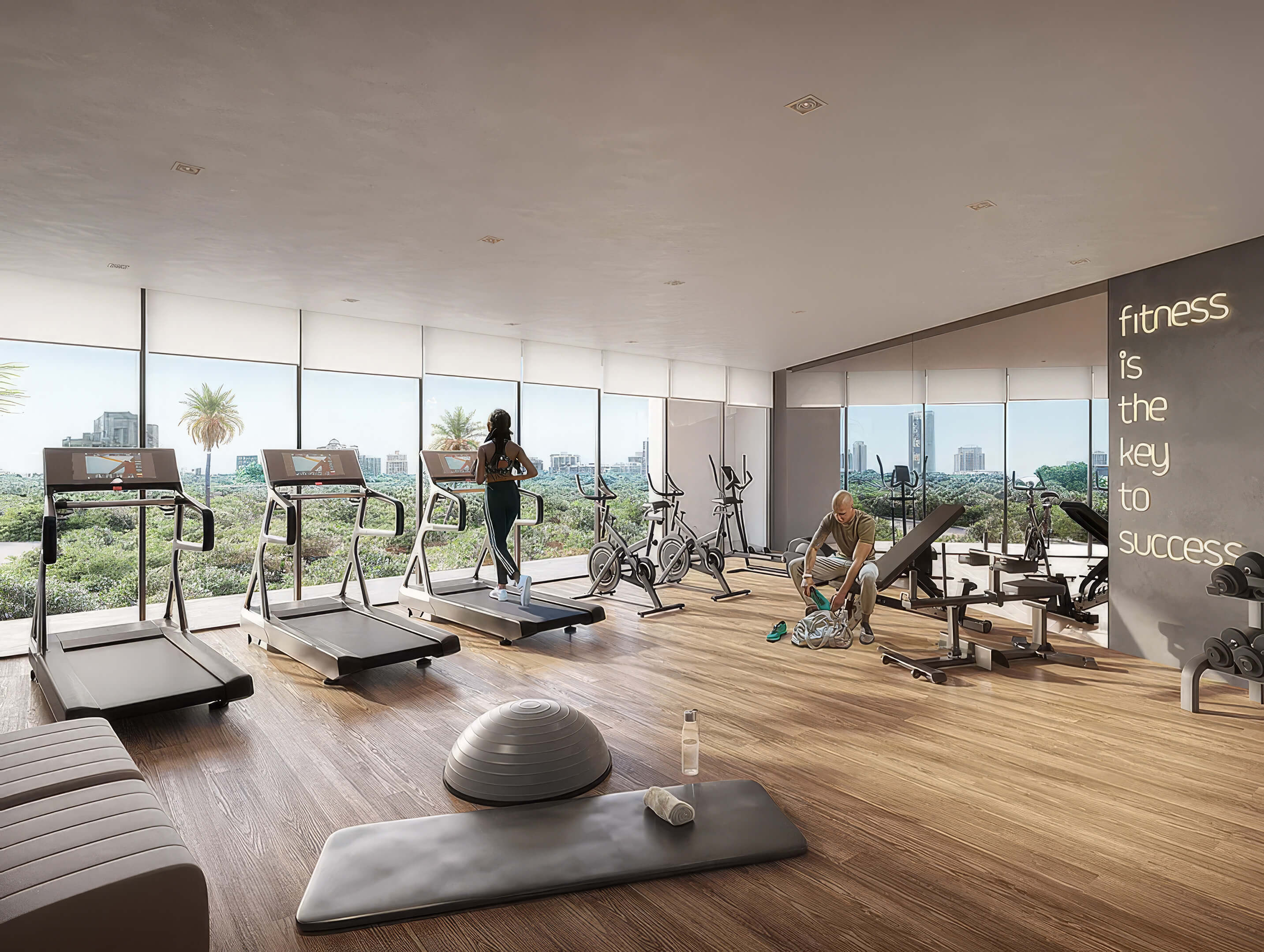Fitness center at Canal by IQ with treadmills, exercise equipment and panoramic city views