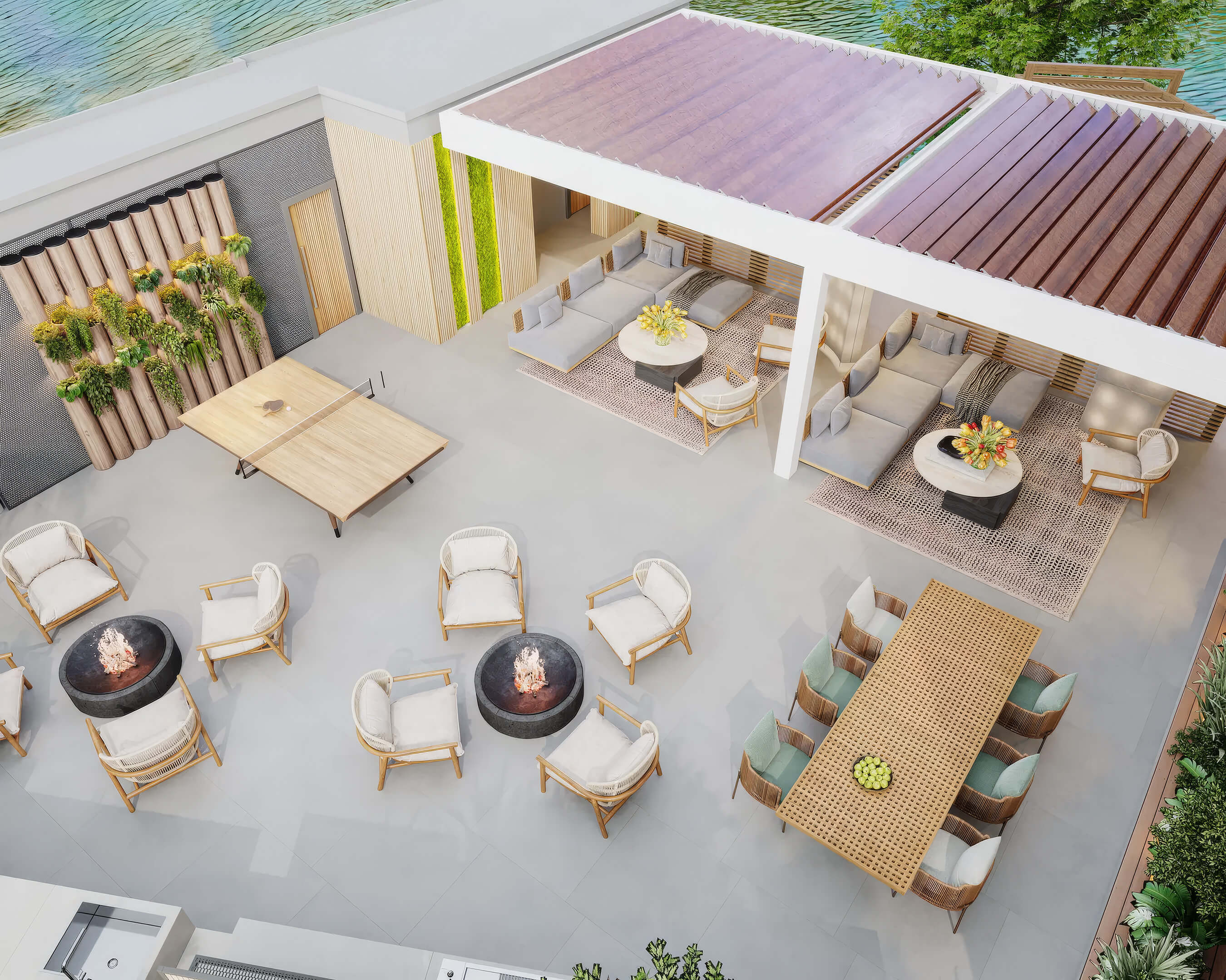Outdoor amenity deck at Canal by IQ with lounge seating, dining area and fire pits