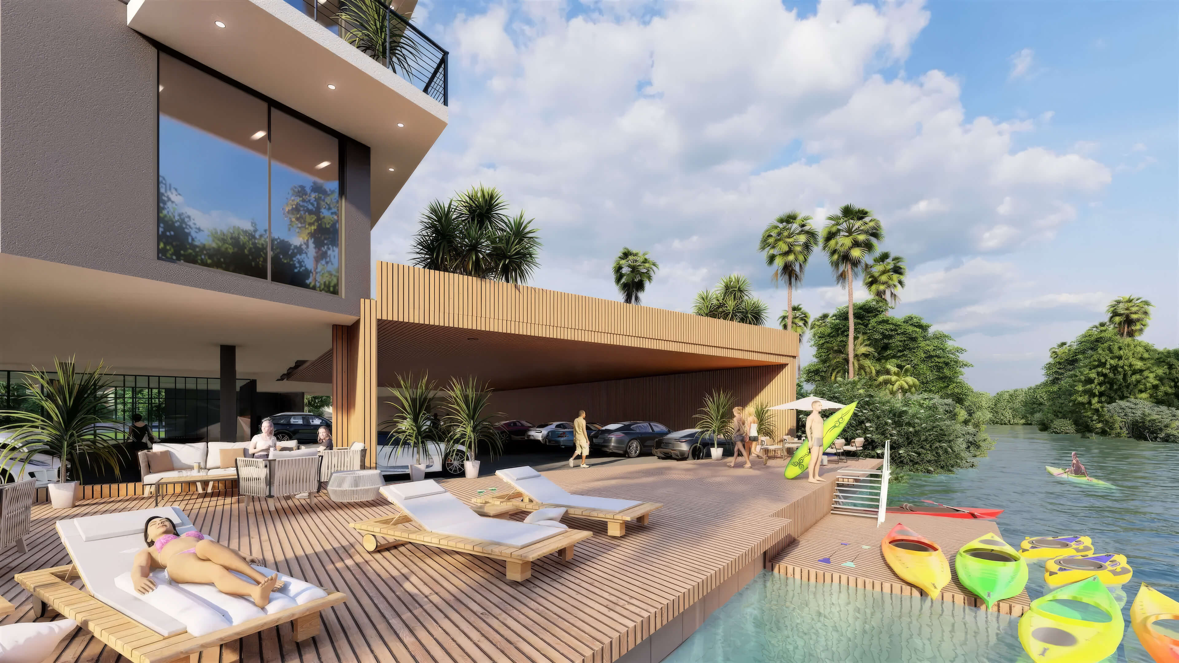 Waterfront deck at Canal by IQ with lounge chairs, kayaks and direct canal access