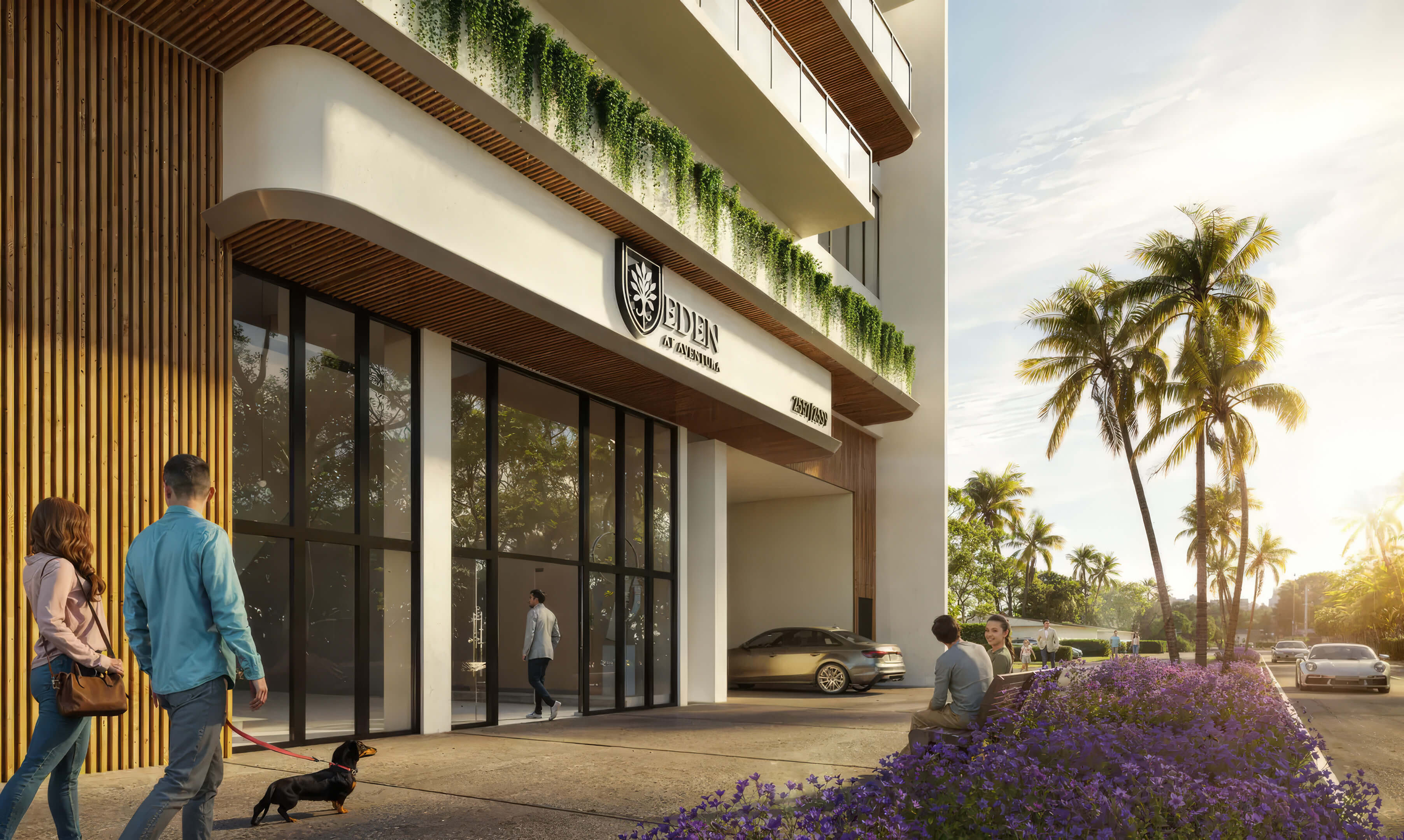 Luxury entrance of EDEN Residences in Aventura with tropical landscaping and modern facade