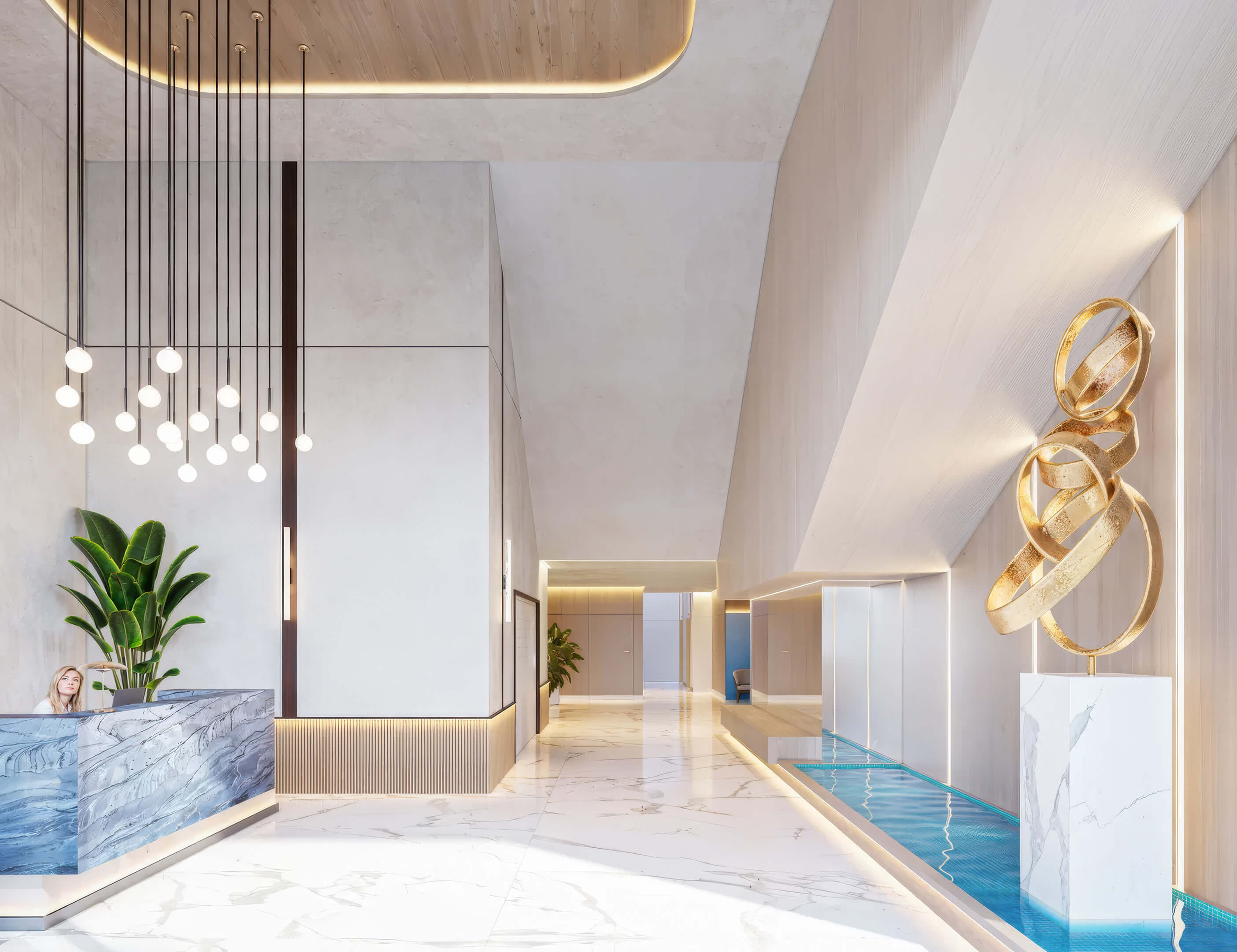 Luxury lobby at EDEN Residences with water feature, modern sculpture and bright interior design