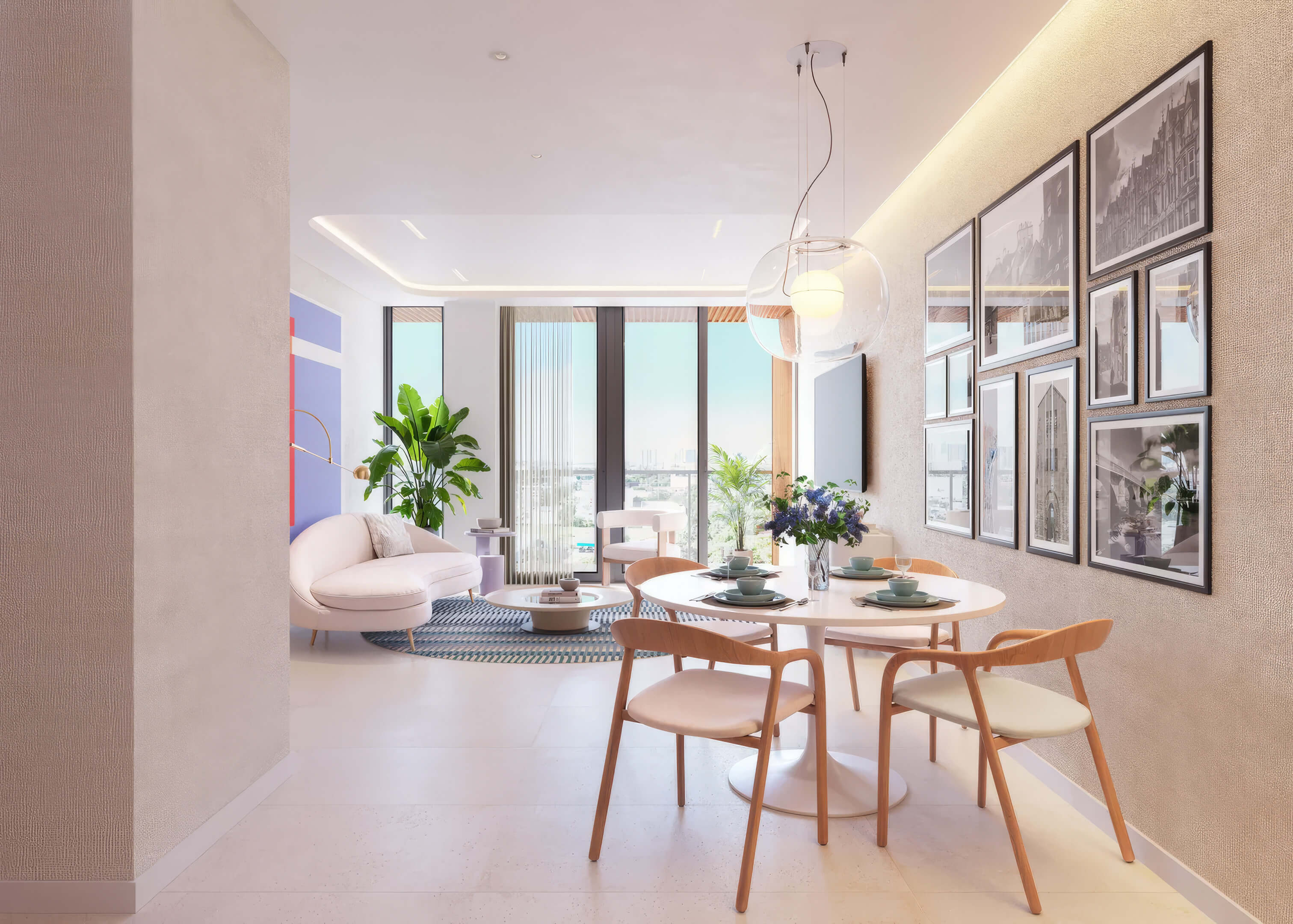 Open living and dining area at EDEN Residences with balcony views and contemporary interior design