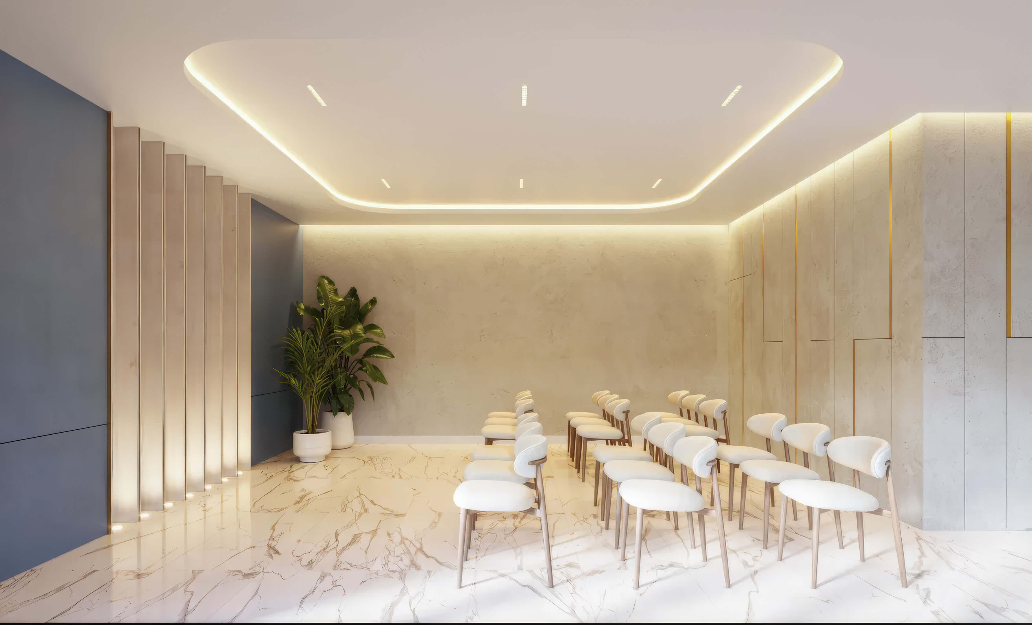 Private meeting room at EDEN Residences with marble floors, modern seating and warm recessed lighting