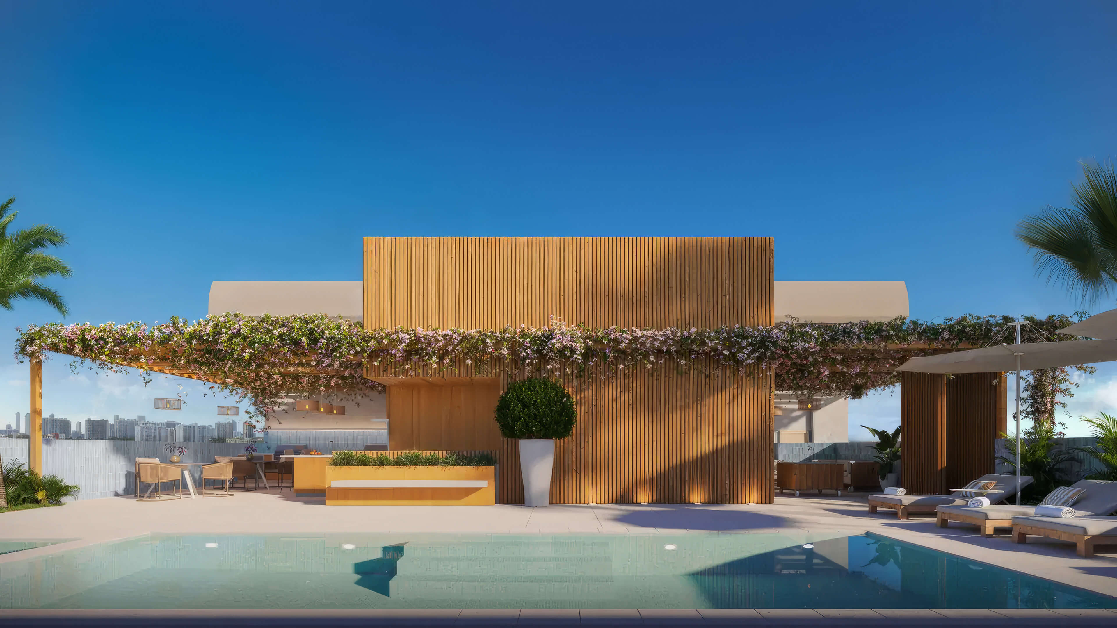 Rooftop pool terrace at EDEN Residences with sun loungers, pergola and panoramic city views