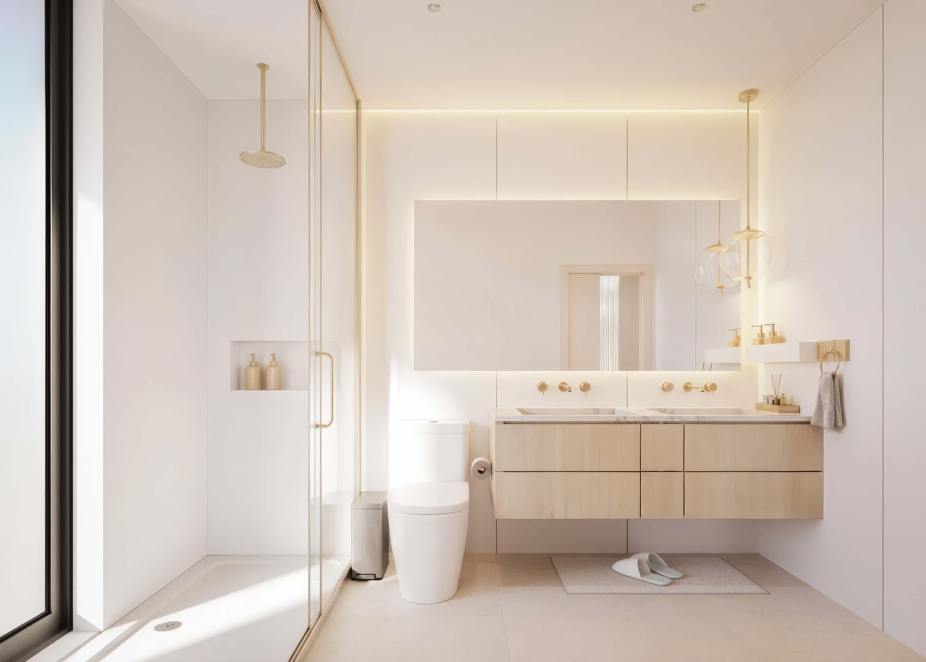 Spa inspired bathroom at EDEN Residences with glass shower, double vanity and gold fixtures
