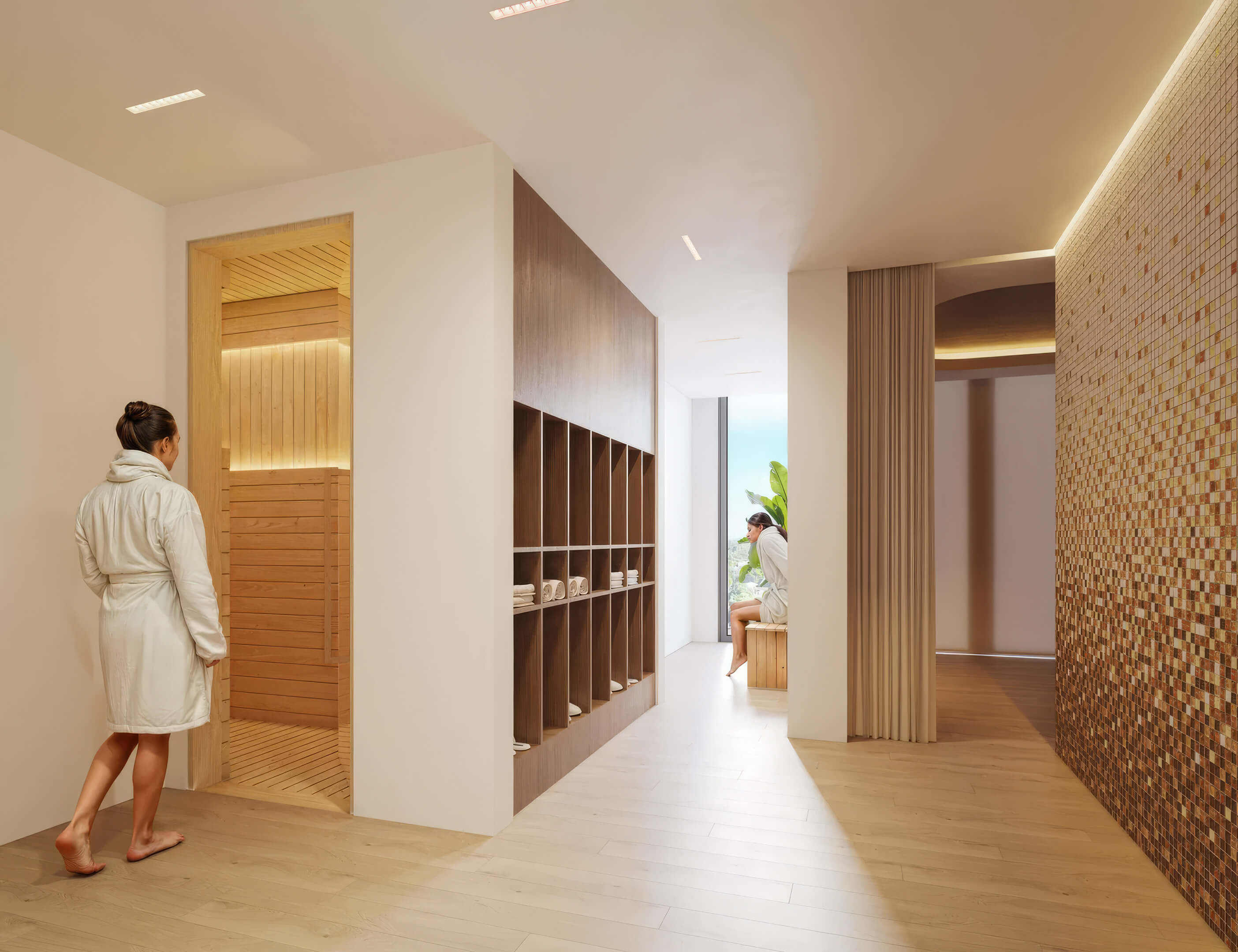 Spa and sauna relaxation area at EDEN Residences with wood lockers, mosaic wall and calming interior design
